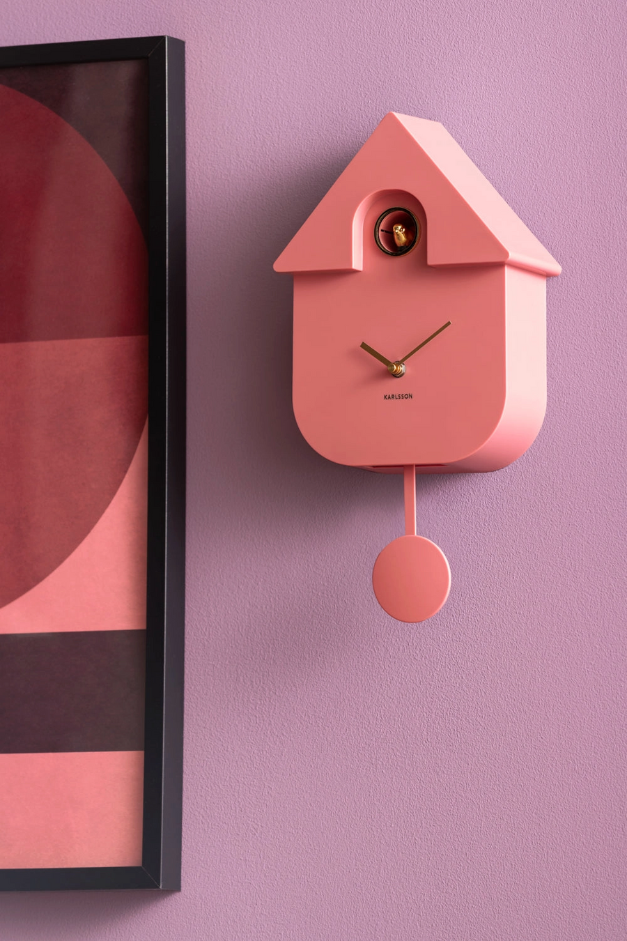 Wandklok Modern Cuckoo roze