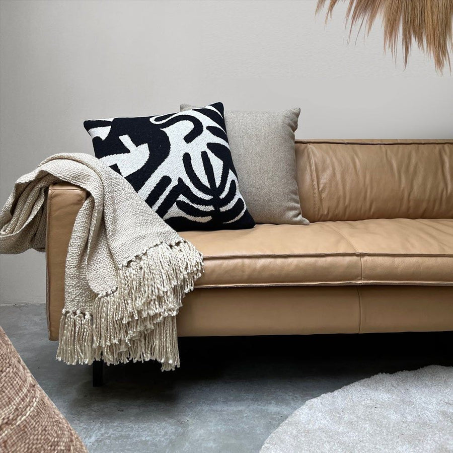 Floral victory knitted cushion black