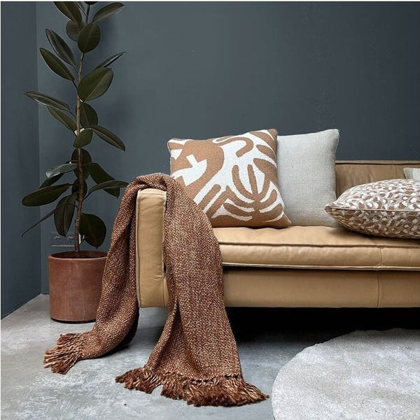 Floral victory knitted cushion fudge