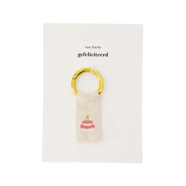 ansichtkaart sleutelhanger taart wit/roze